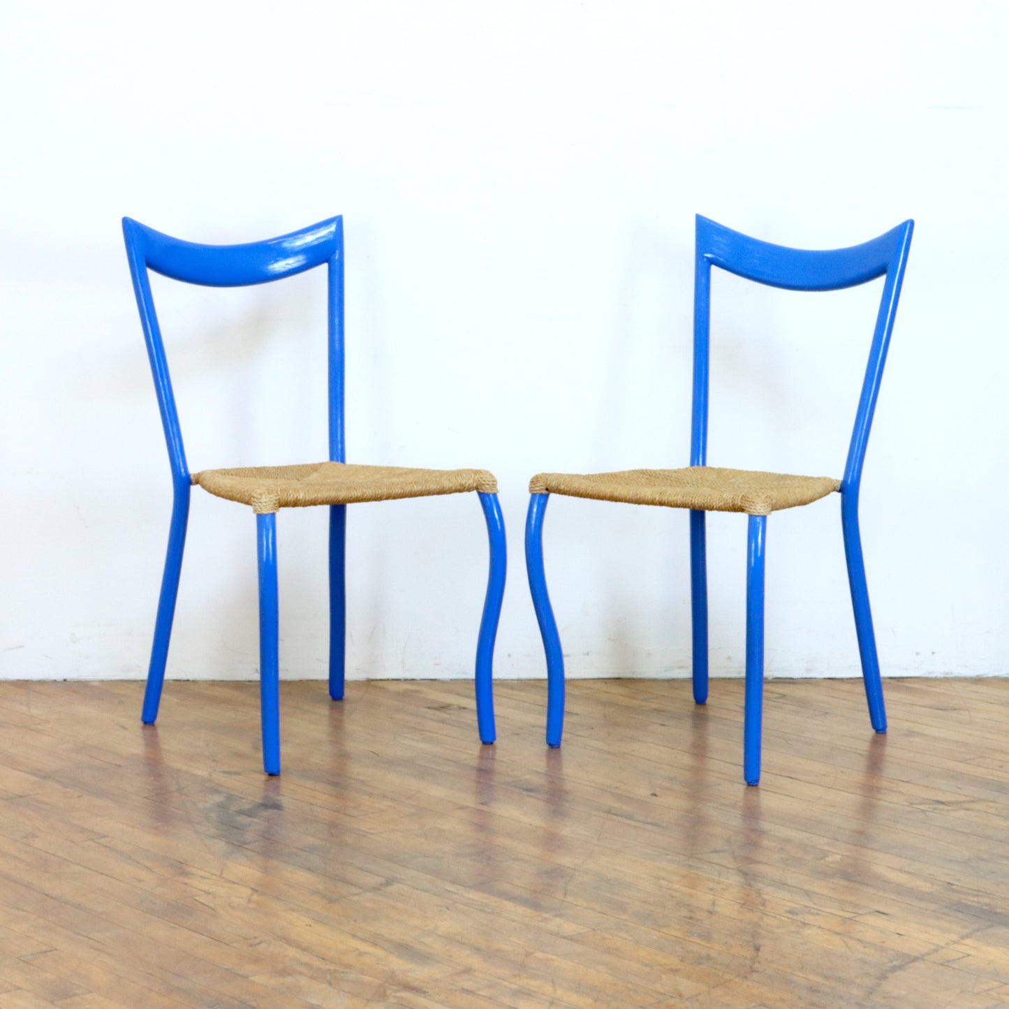 Pair of "Manila" Chairs by Val Padilla