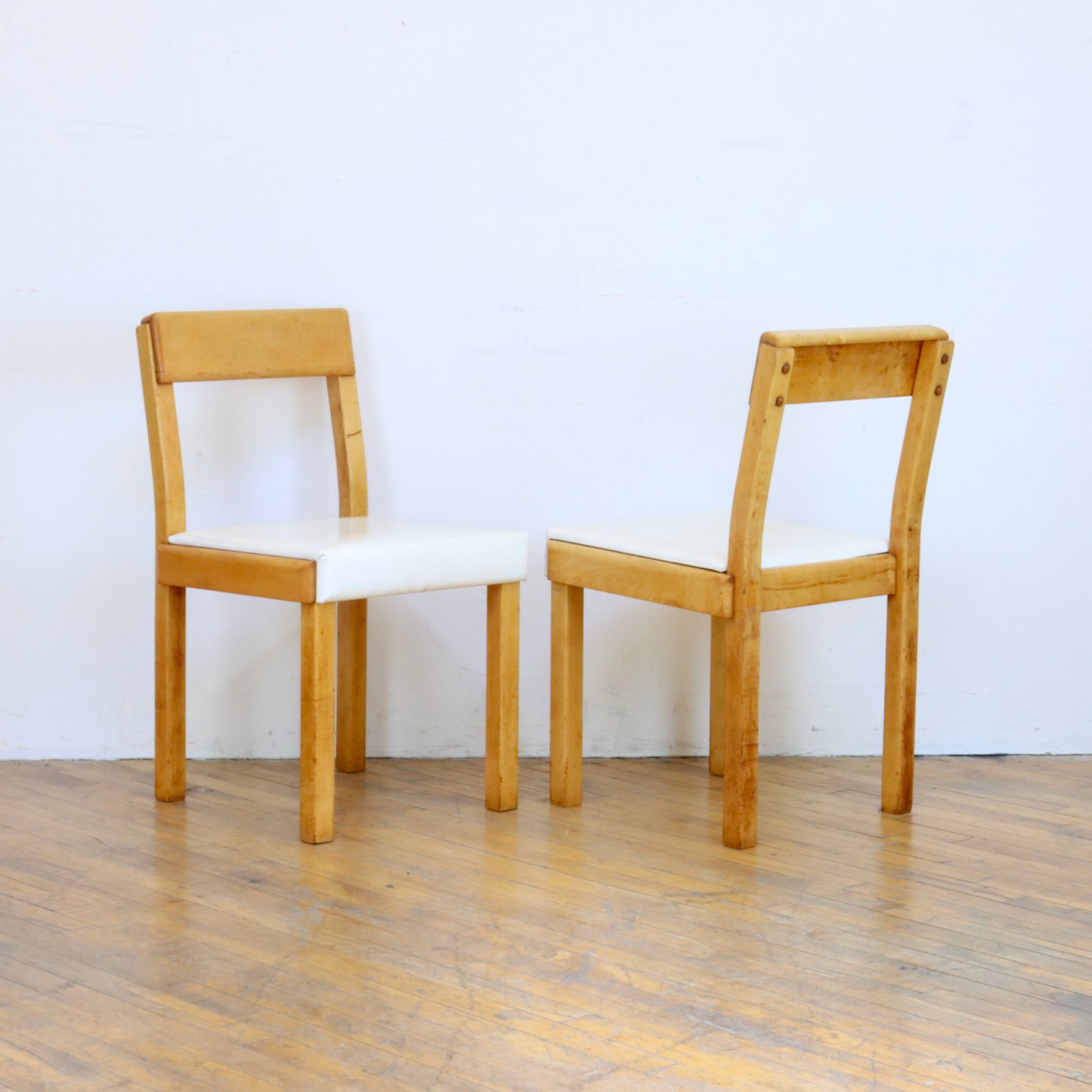 Pair of 1935 Russel Wright "American Modern" Chairs